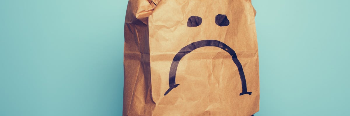 Paper Bag With Frown Face