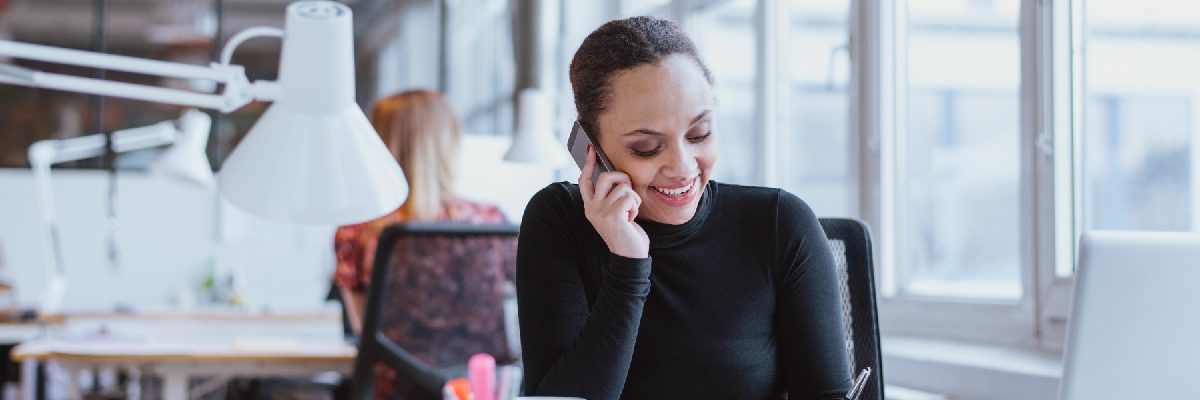 Woman on Cellphone Smiling