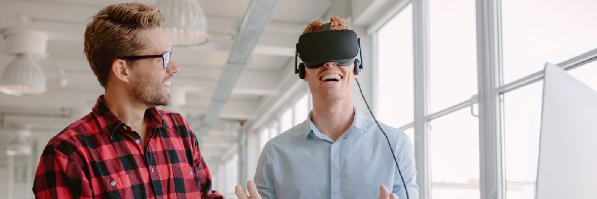 Employee Being Shown how to Use VR for Training